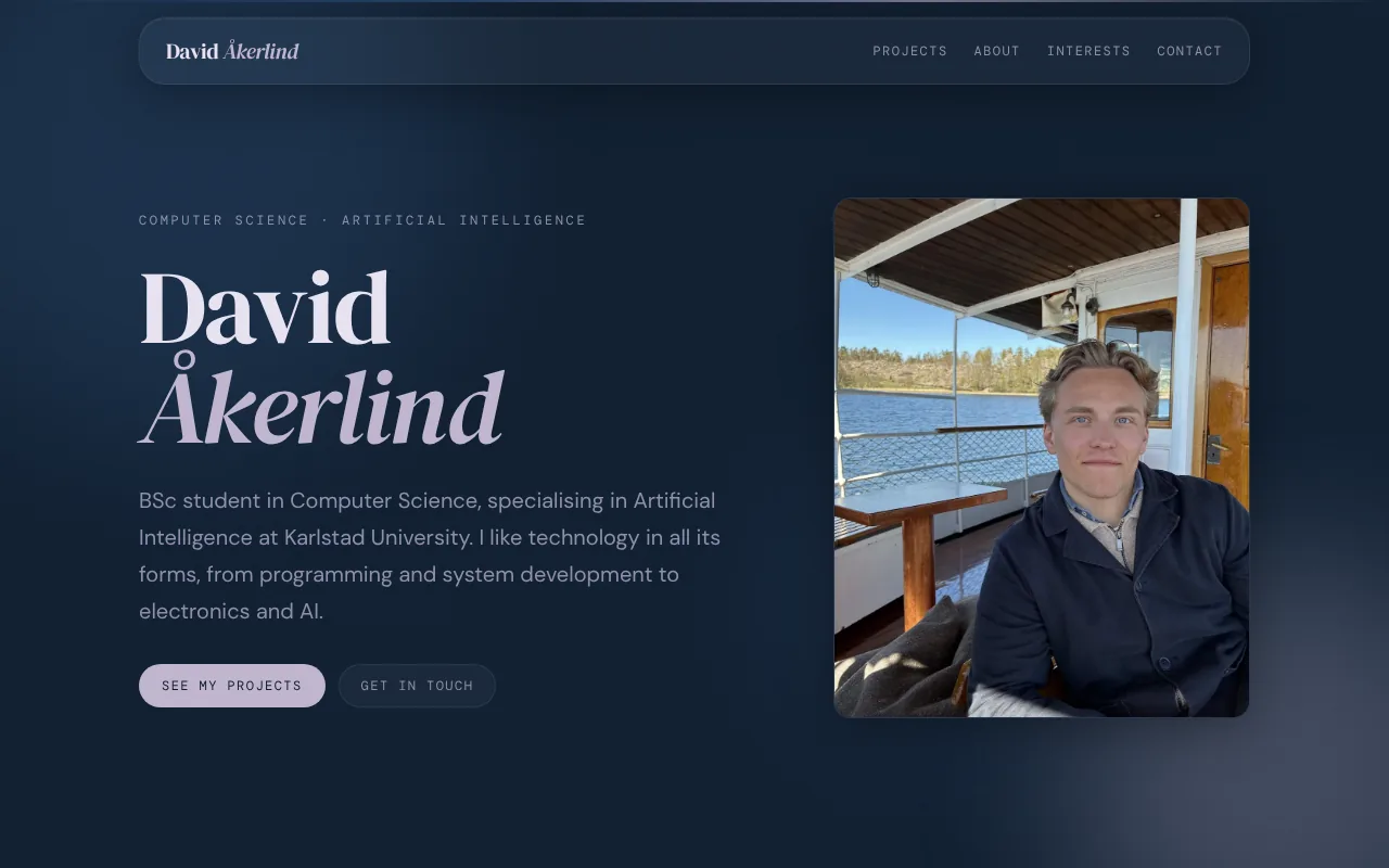 The home page of this portfolio, with a glass header, the name David Åkerlind and a portrait photo